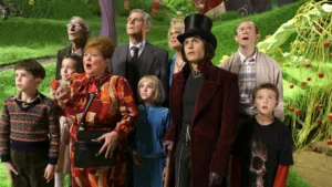 L-r: FREDDIE HIGHMORE, DAVID KELLY, JULIA WINTER, FRANZISKA TROEGNER, JAMES FOX, ANNASOPHIA ROBB,MISSI PYLE, JOHNNY DEPP, ADAM GODLEY and JORDAN FRY in Warner Bros. Picturesí and Village Roadshow Picturesí fantasy adventure ìCharlie and the Chocolate Factory,î distributed by Warner Bros. Pictures. PHOTOGRAPHS TO BE USED SOLELY FOR ADVERTISING, PROMOTION, PUBLICITY OR REVIEWS OF THIS SPECIFIC MOTION PICTURE AND TO REMAIN THE PROPERTY OF THE STUDIO. NOT FOR SALE OR REDISTRIBUTION.