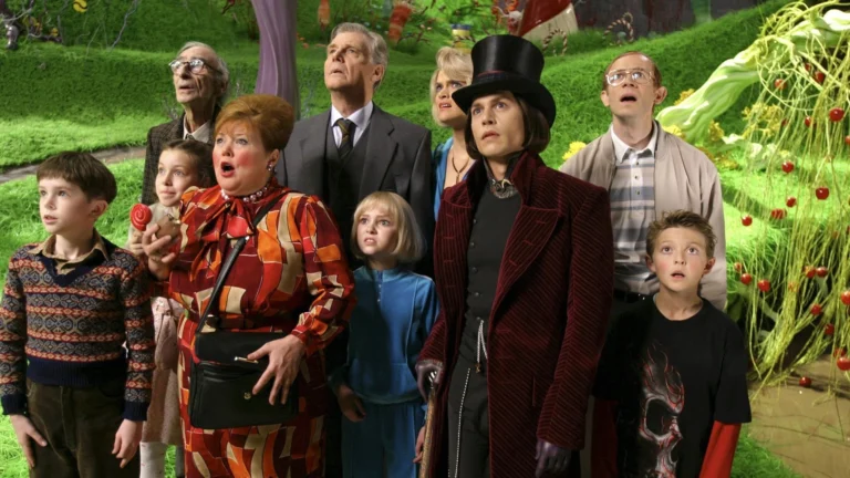 L-r: FREDDIE HIGHMORE, DAVID KELLY, JULIA WINTER, FRANZISKA TROEGNER, JAMES FOX, ANNASOPHIA ROBB,MISSI PYLE, JOHNNY DEPP, ADAM GODLEY and JORDAN FRY in Warner Bros. Picturesí and Village Roadshow Picturesí fantasy adventure ìCharlie and the Chocolate Factory,î distributed by Warner Bros. Pictures. PHOTOGRAPHS TO BE USED SOLELY FOR ADVERTISING, PROMOTION, PUBLICITY OR REVIEWS OF THIS SPECIFIC MOTION PICTURE AND TO REMAIN THE PROPERTY OF THE STUDIO. NOT FOR SALE OR REDISTRIBUTION.