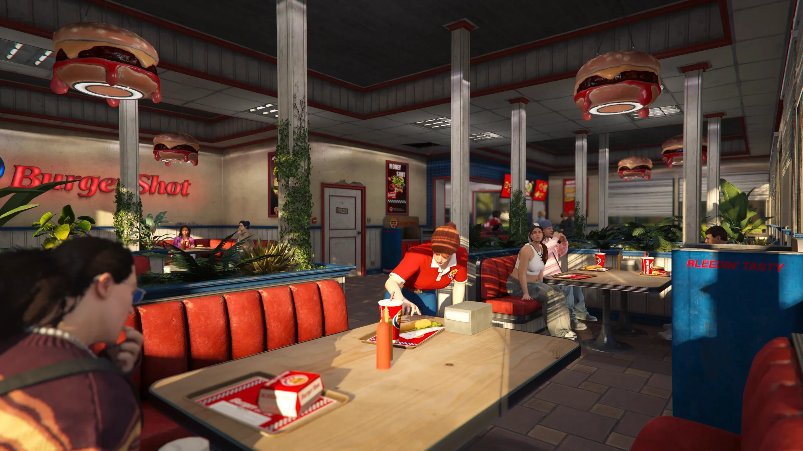 Interior do Burger Shot reformulado no NoPixel V com personagens e mesas