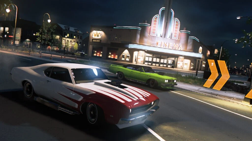 Carros correndo pelas ruas de New Bordeaux em Mafia III