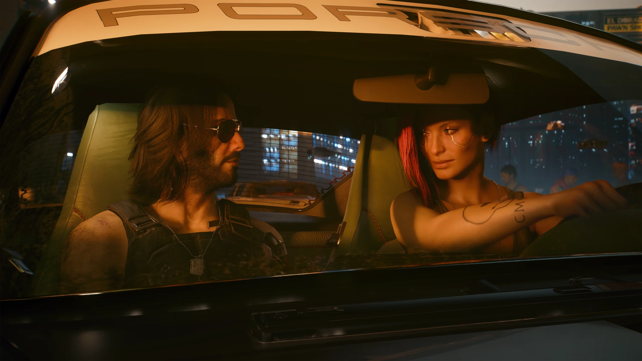 V e Johnny Silverhand sentados em um carro em Night City