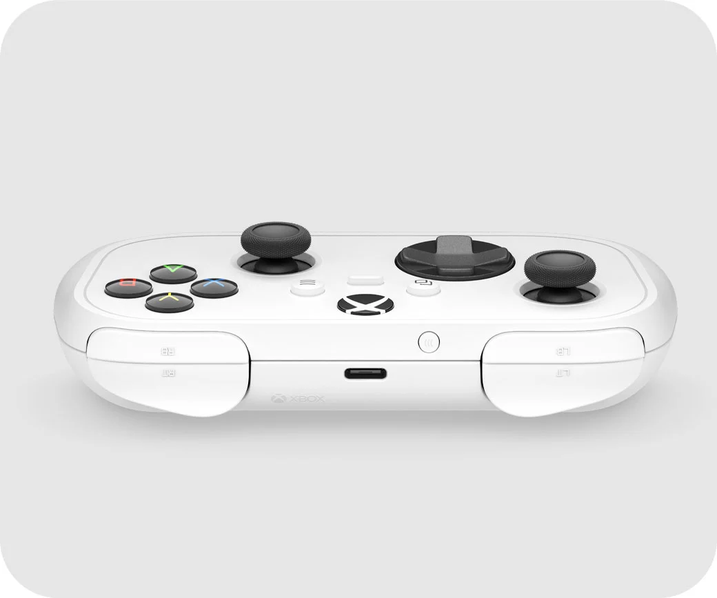 Parte superior do Xbox Nano com botão USB-C, gatilhos, direcionais e analógicos