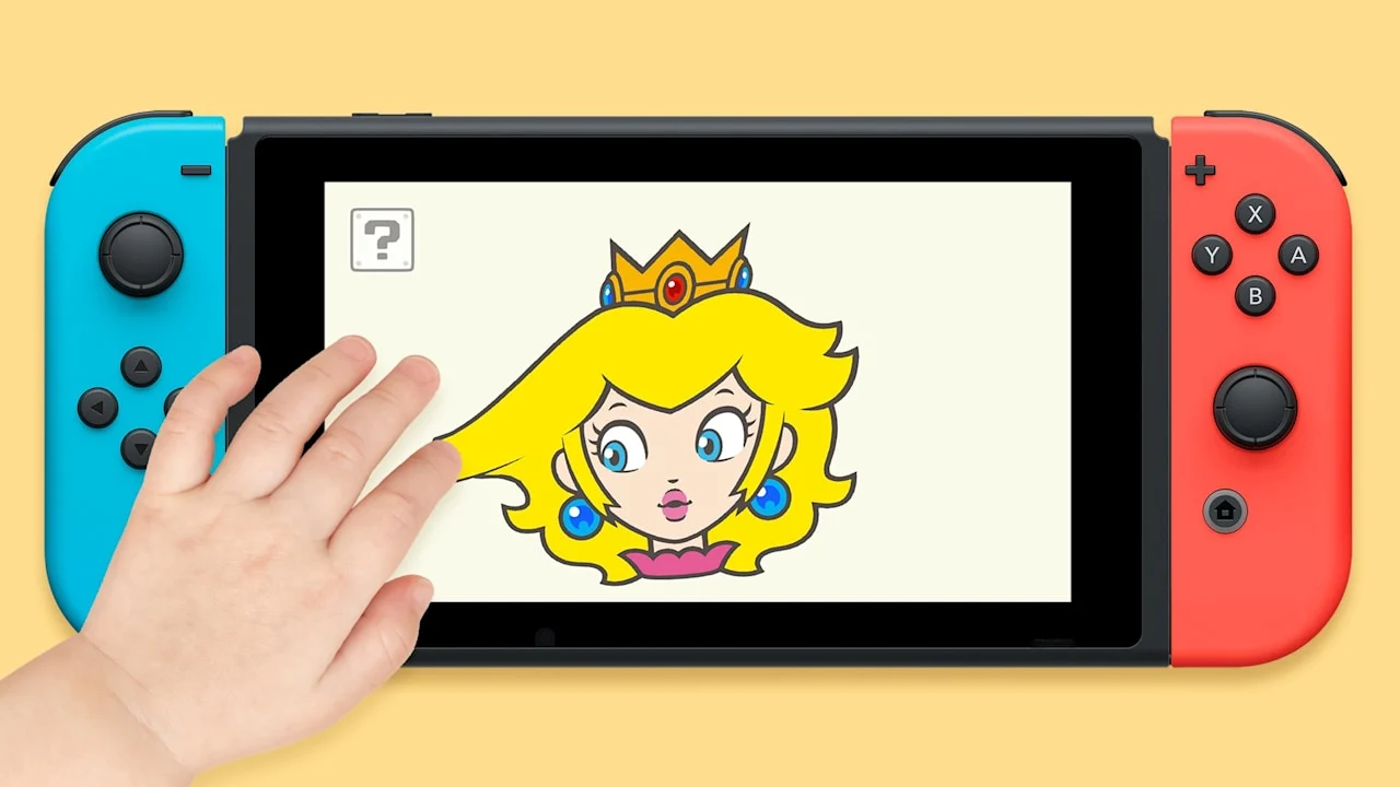 Mão interage com o cabelo de Peach na tela de um Nintendo Switch no aplicativo Olá, Peach!