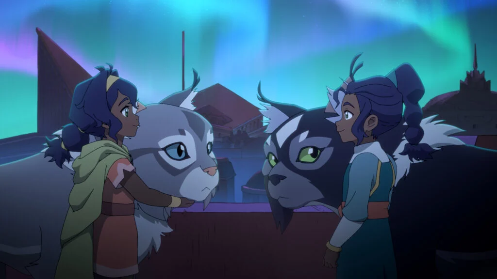 Pavi e sua irmã gêmea Nisha frente a frente acompanhadas de dois animais em Avatar Os Sete Refúgios
