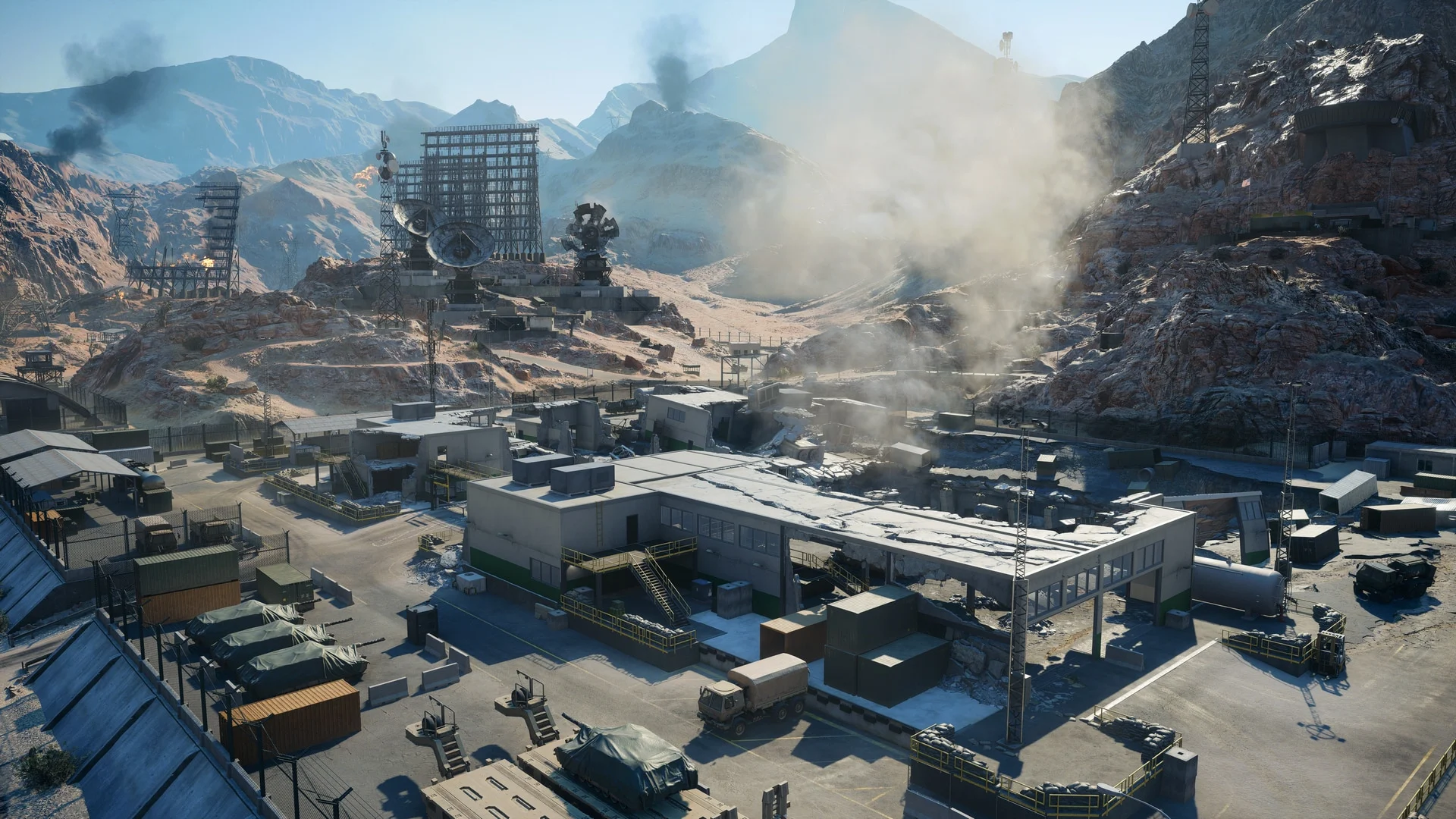 Base militar cercada por deserto e estruturas destruídas no mapa Área 51 de Battlefield 6