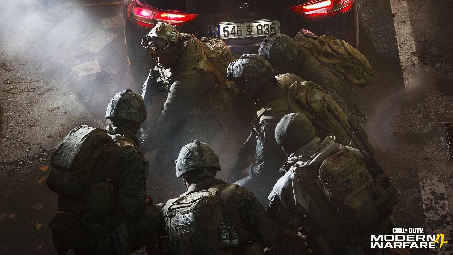 Soldados sul-coreanos se protegem atrás de veículo em cena de Call of Duty: Modern Warfare 4
