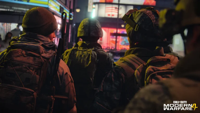 Soldados avançam por uma área urbana iluminada em Call of Duty Modern Warfare 4
