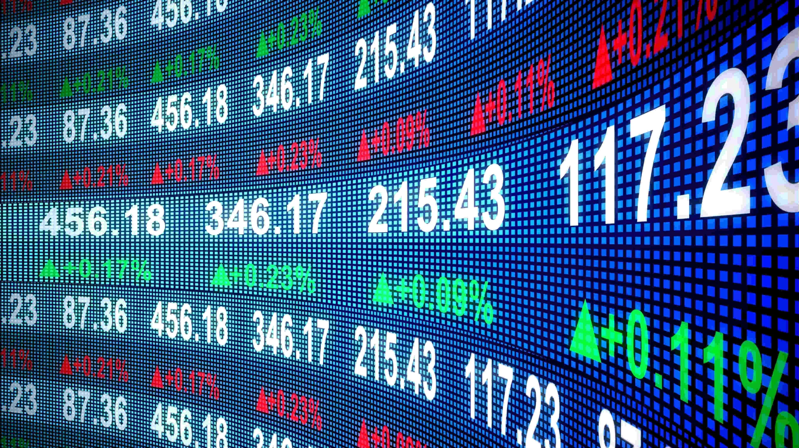Painel ilustrativo de mercado financeiro com cotações e números em cores variadas