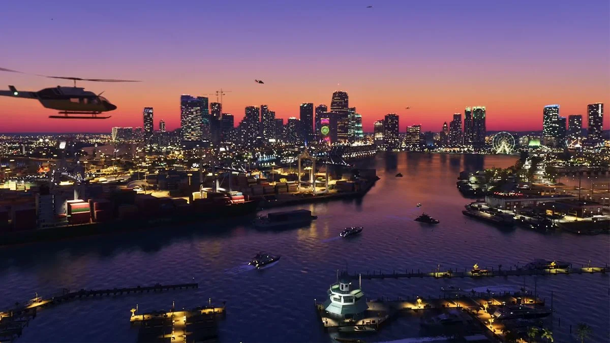 Vista panorâmica de Vice City ao anoitecer, com edifícios iluminados, helicóptero e embarcações em GTA 6