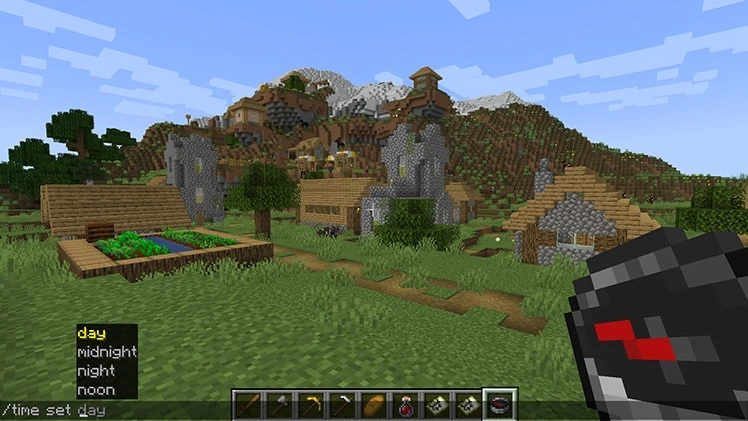 Vila de Minecraft com comando aberto na tela