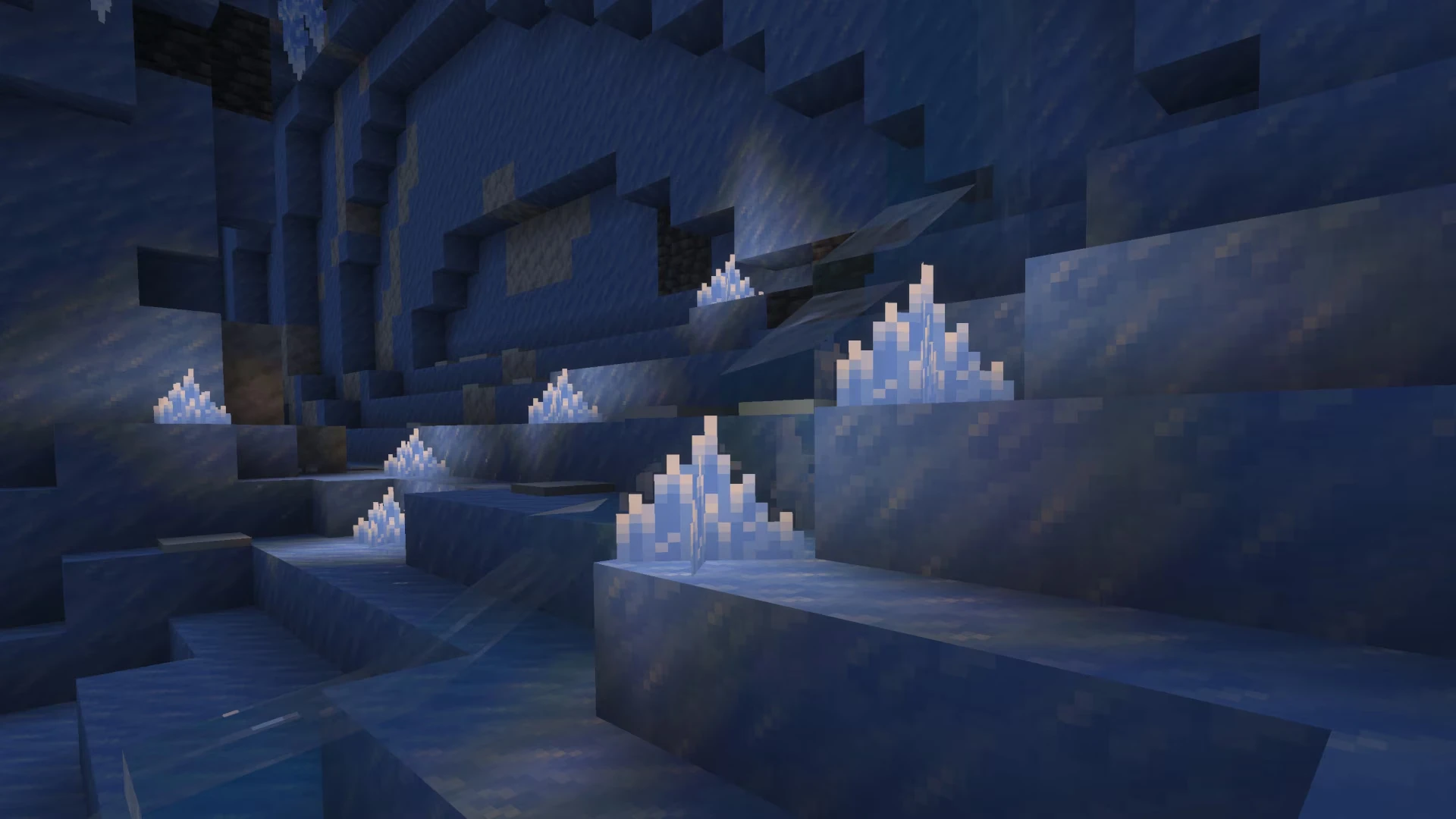 Cristais azuis no chão de uma caverna de gelo do Minecraft