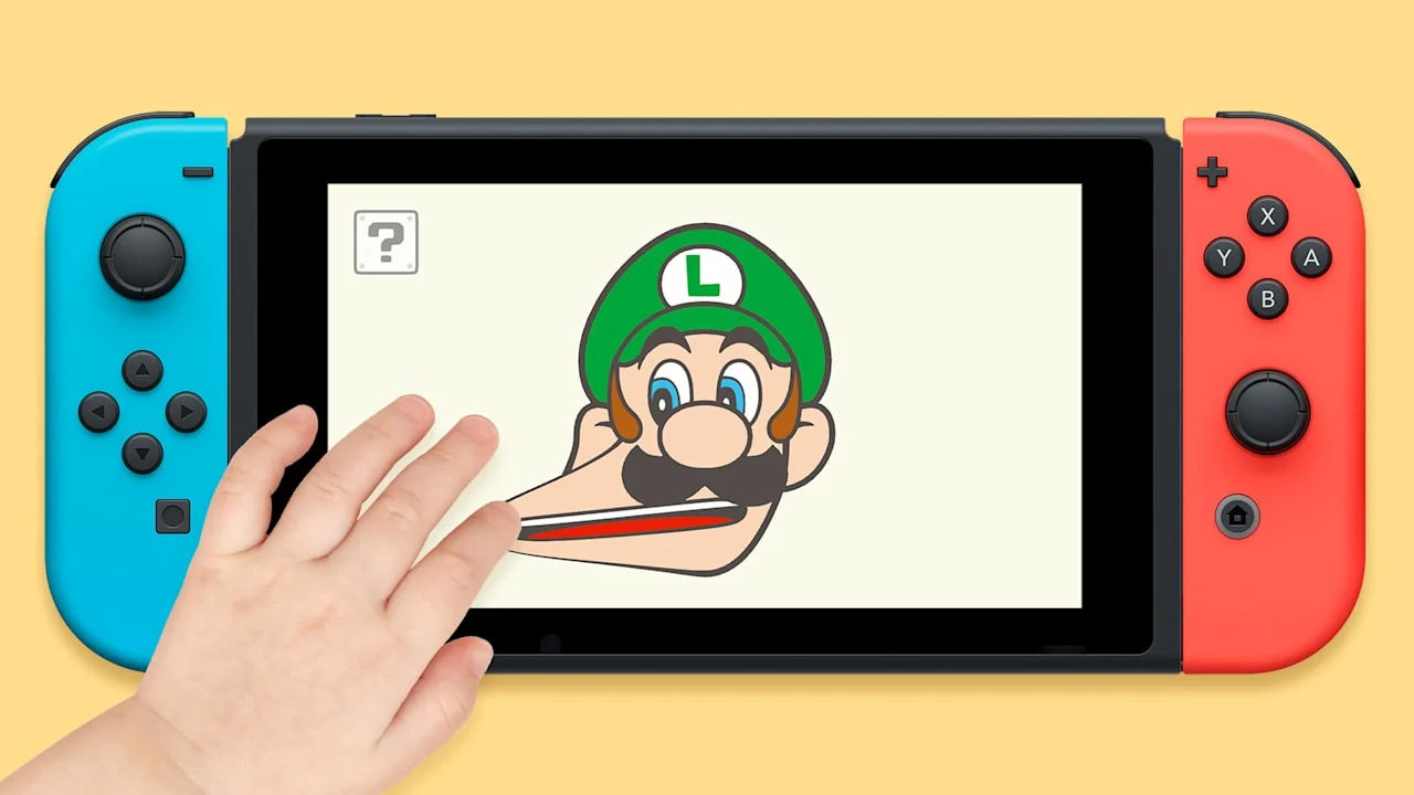 Mão toca a tela de um Nintendo Switch para esticar o rosto de Luigi no aplicativo Olá, Luigi!