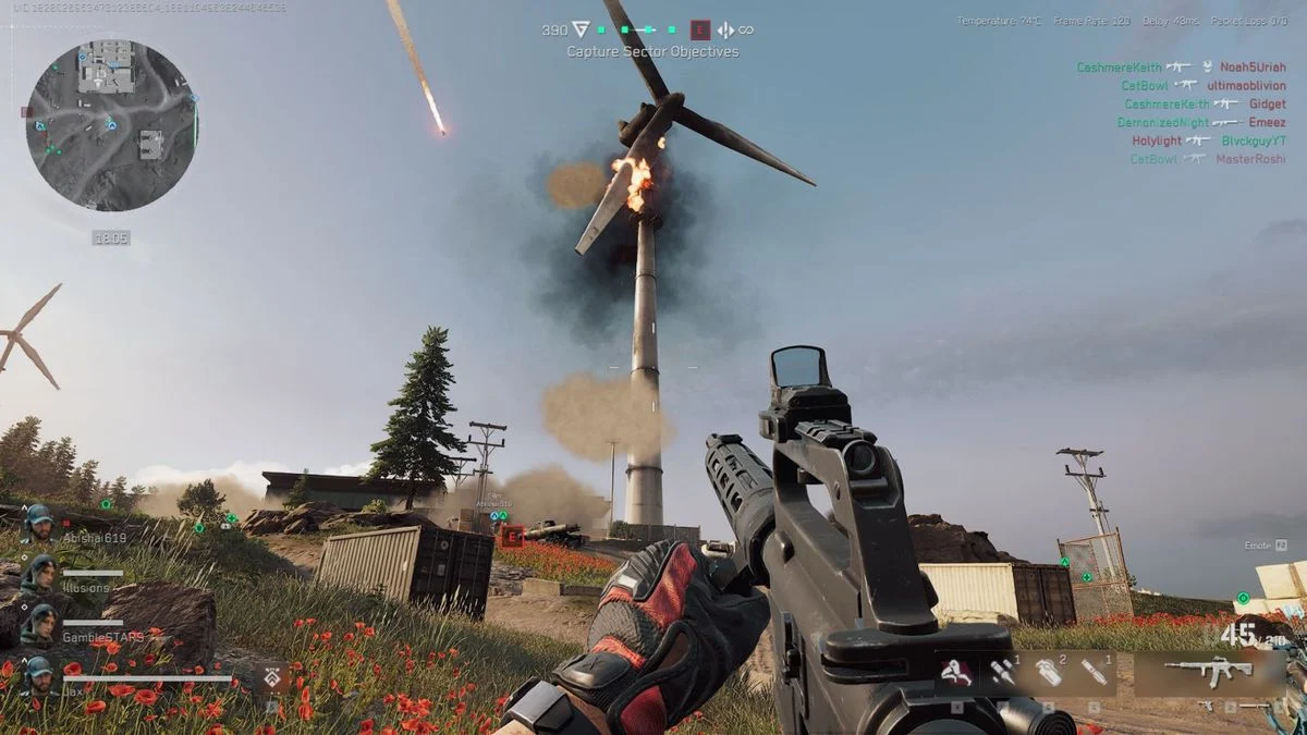 Soldado com arma em primeira pessoa diante de estrutura atingida por explosão no jogo Delta Force.