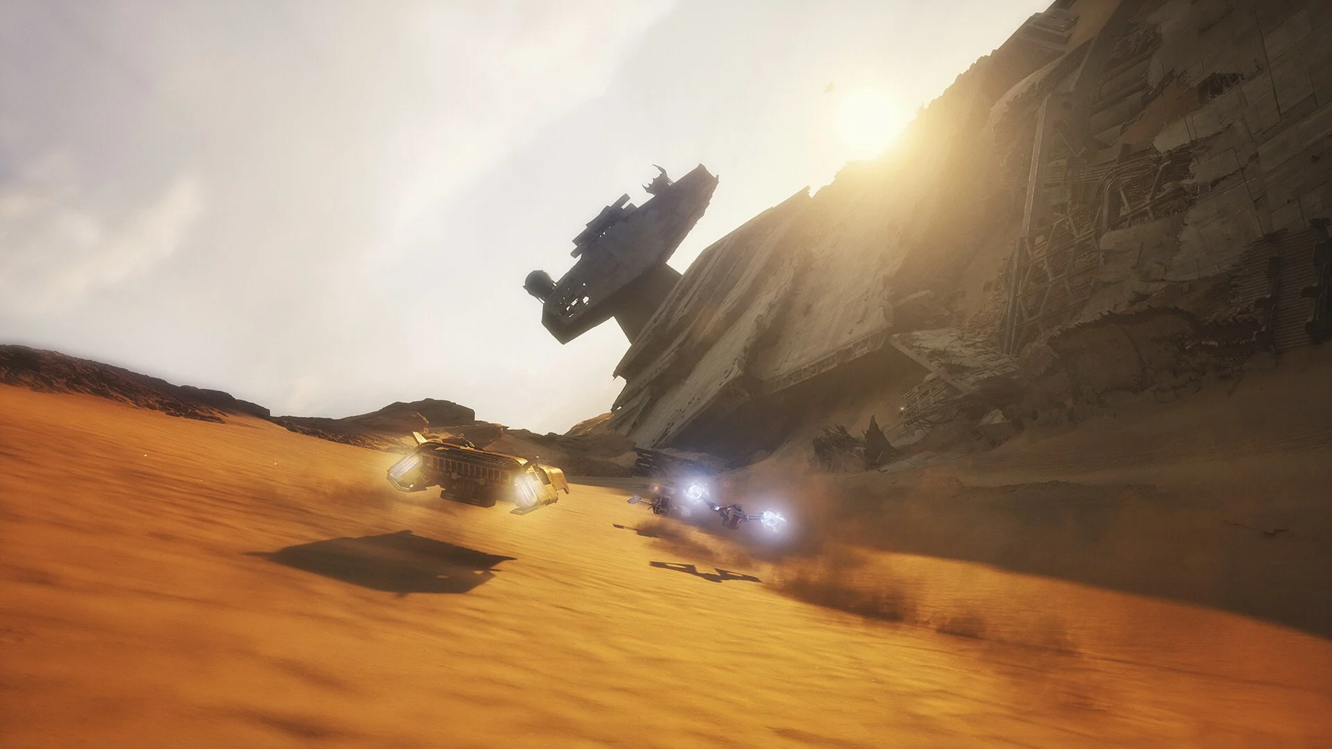 Veículos de Star Wars Galactic Racer disputam corrida em Jakku ao lado de destroços de um Star Destroyer